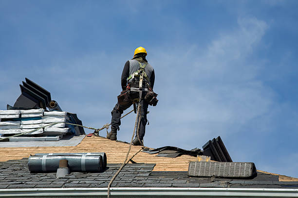 Professional Roofing technician working in Tate, GA